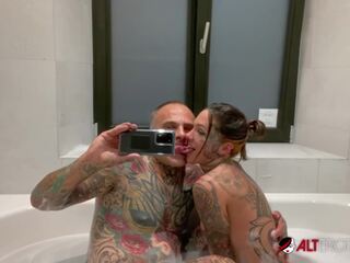 Busty inked chick stuffed by a big dick in the bath